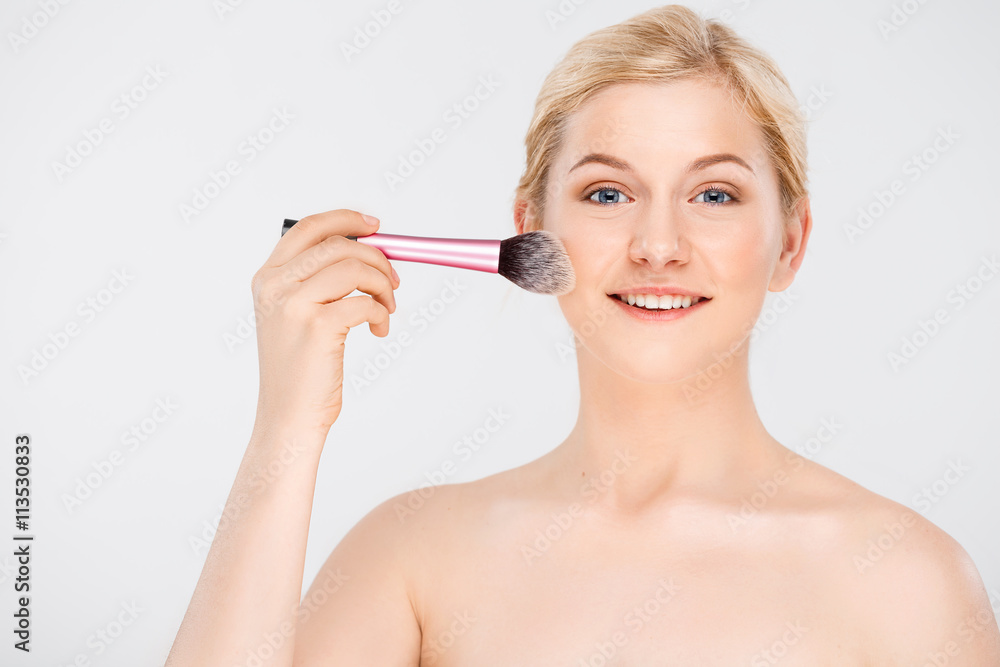 Portrait of young pretty girl over white background. Portrait of young pretty girl over white background.