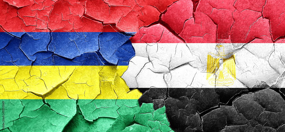 Mauritius flag with egypt flag on a grunge cracked wall