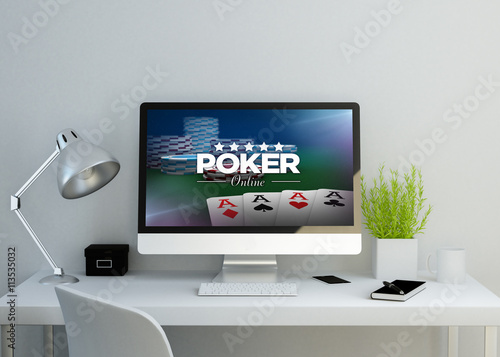 modern clean workspace with poker online website on screen