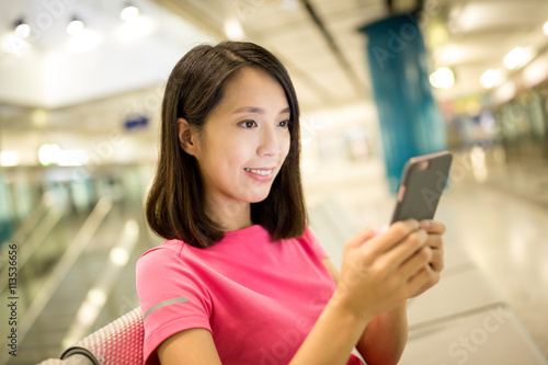 Free Download Asian woman use of mobile phone - GFXLoad