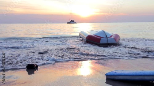Inflatable upturned boat near the beach