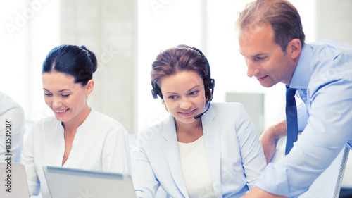 group of people working in call center