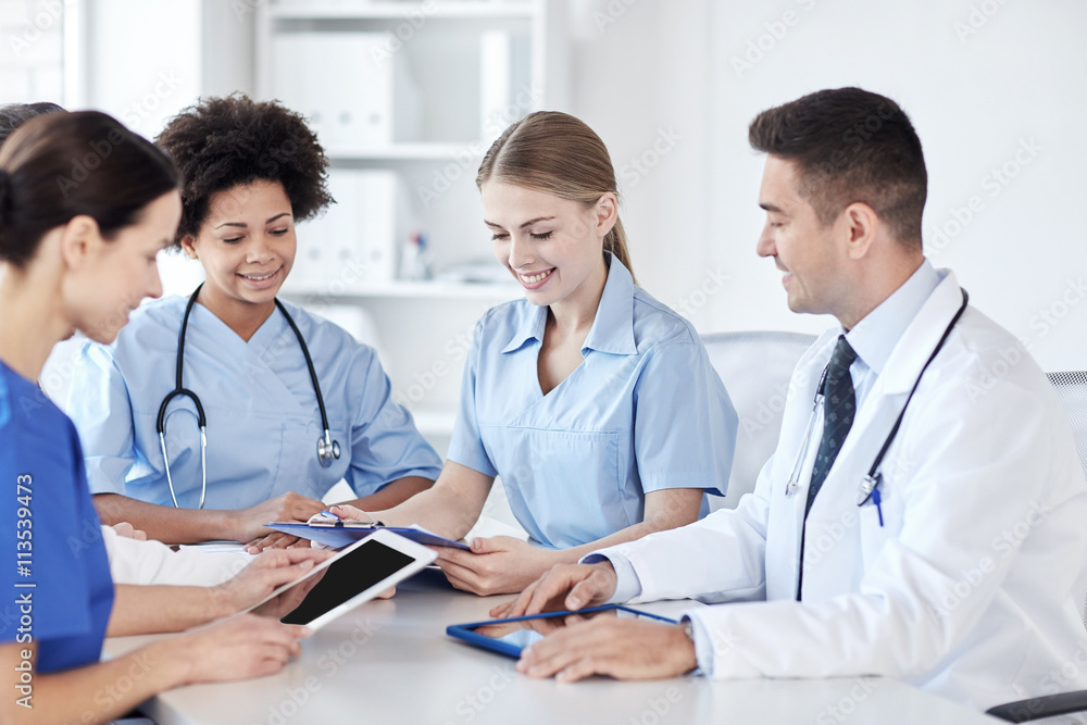 group of happy doctors meeting at hospital office group of happy doctors meeting at hospital office