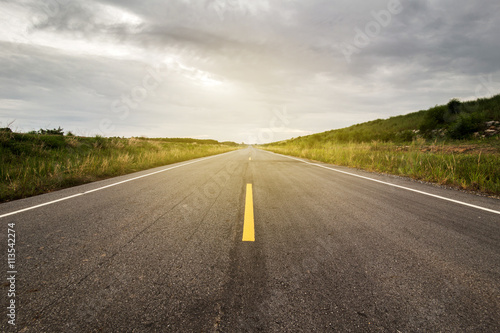 Natural asphalt road, horizontal photo.