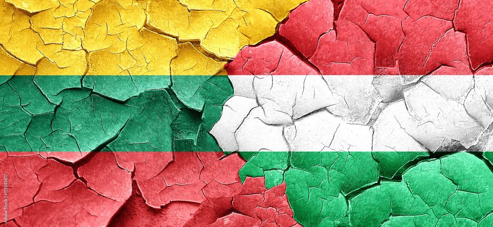 Lithuania flag with Hungary flag on a grunge cracked wall
