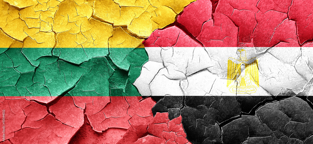 Lithuania flag with egypt flag on a grunge cracked wall