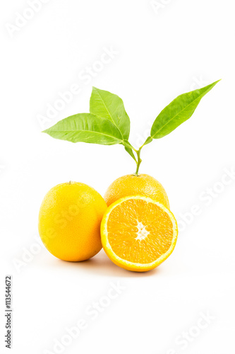 Fresh oranges isolated with leafs on white background