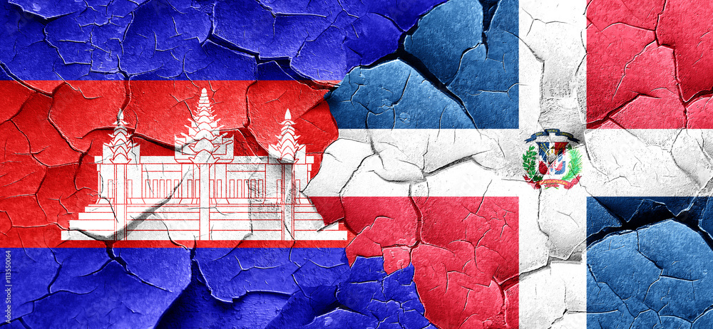 Cambodia flag with Dominican Republic flag on a grunge cracked w