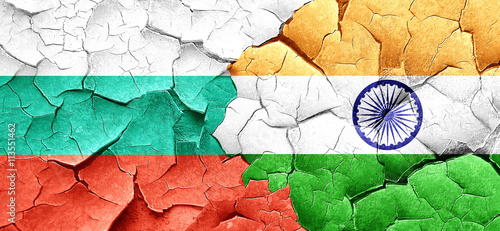bulgaria flag with India flag on a grunge cracked wall