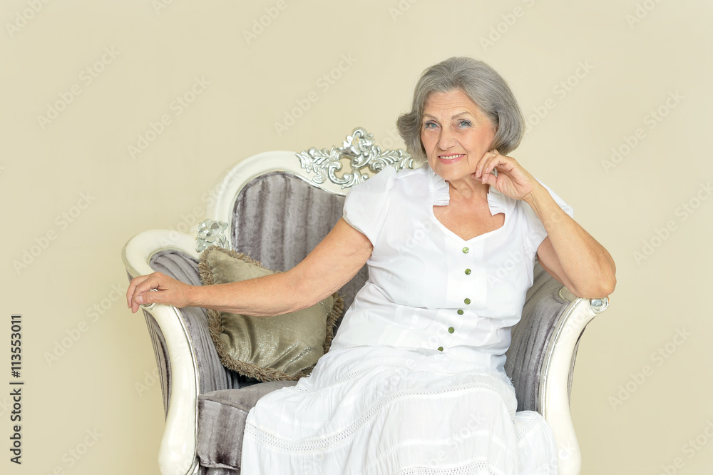 elderly woman on  vintage chair