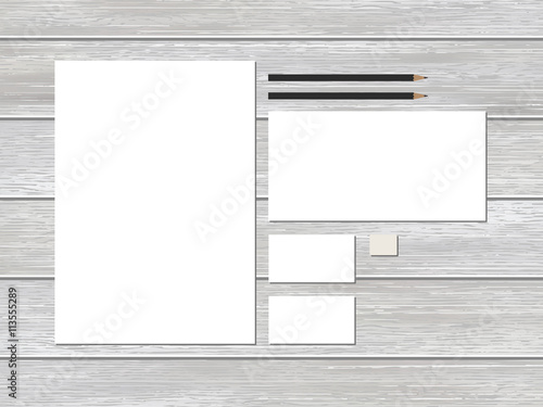 Mock-up business stationery template on wood.