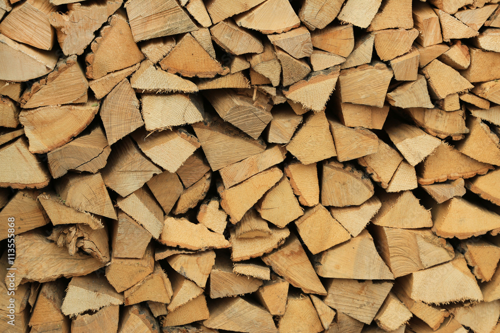 Background of a large quantity of firewood Background of a large quantity of firewood