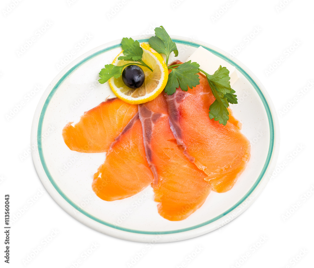 Delicious sliced salmon with lemon.
