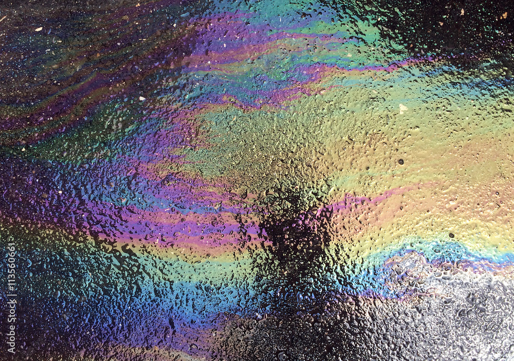 Human silhouette shadow on oil spill background Human silhouette shadow on oil spill background