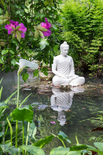 Buddha statue in Andre Heller garden in Gardone Riviera, Lombardia, Italy
