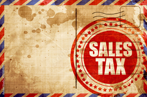 sales tax, red grunge stamp on an airmail background