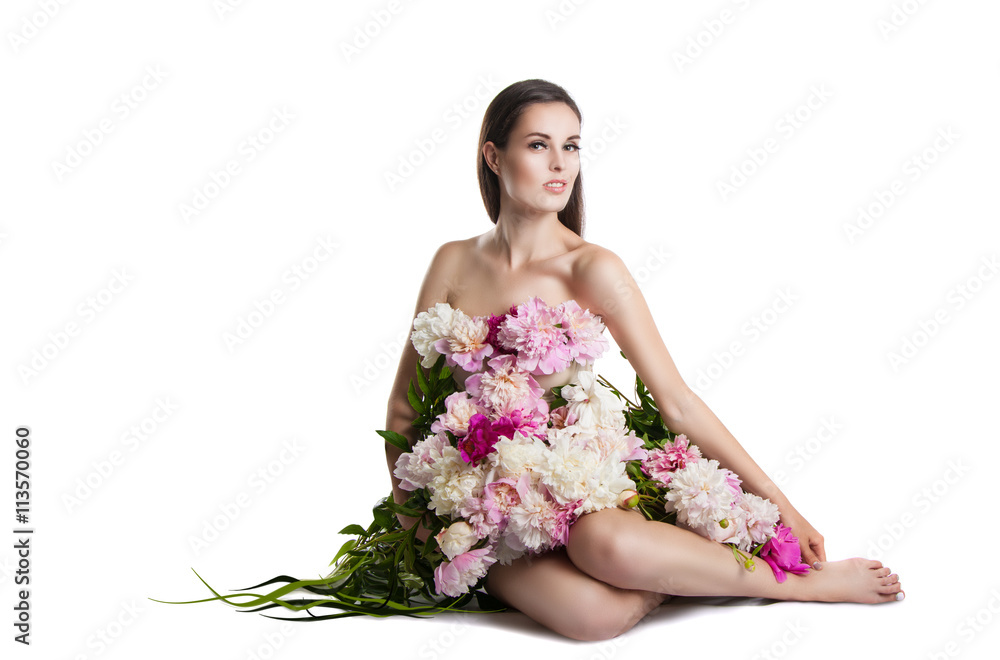 beautiful girl with flowers peonies. Portrait of a young woman with a dress of flowers. beautiful girl with flowers peonies. Portrait of a young woman with a dress of flowers.