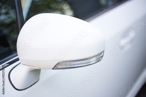 close up of white car mirror