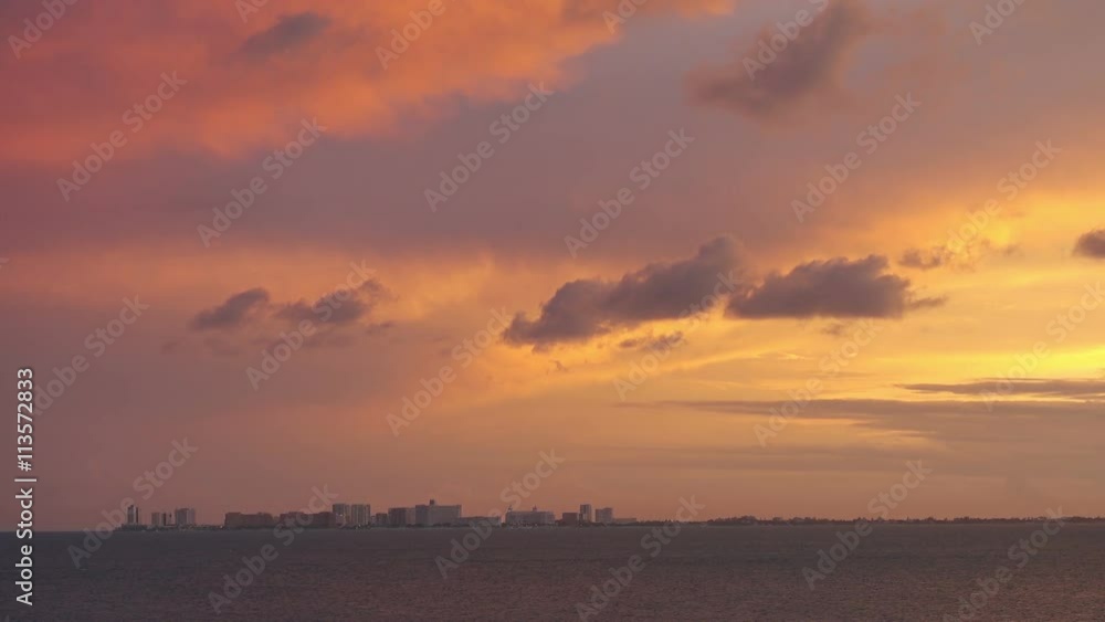 cancun city skyline cityscape as seen from the sea at sunset cancun city skyline cityscape as seen from the sea at sunset