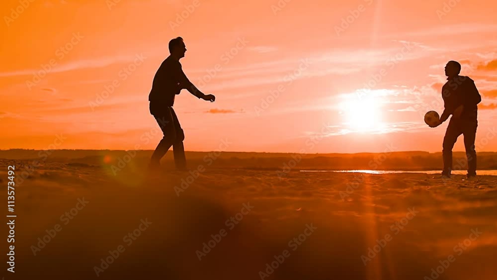 against a red sunset play ball two slow motion video against a red sunset play ball two slow motion video