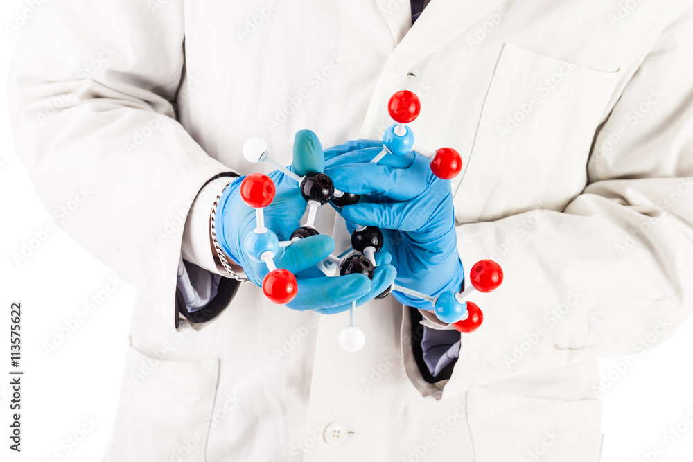 Laboratory researcher with tnt molecule structure Laboratory researcher with tnt molecule structure