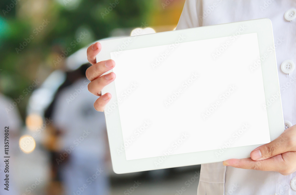 female doctor hold tablet computer with ambulance responding to female doctor hold tablet computer with ambulance responding to