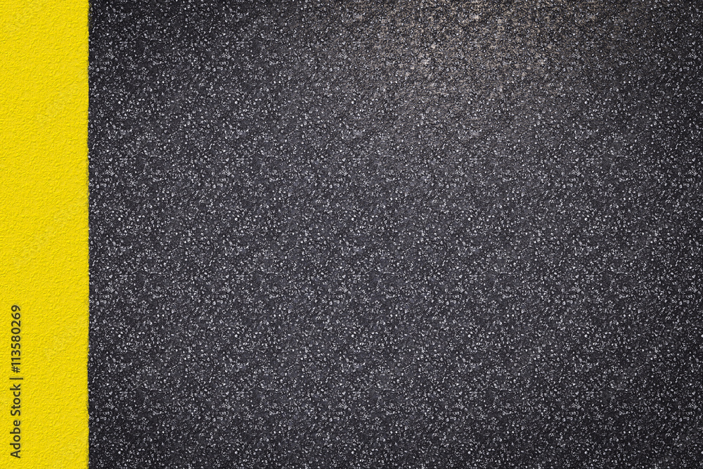 Fototapeta premium asphalt road top view with yellow line