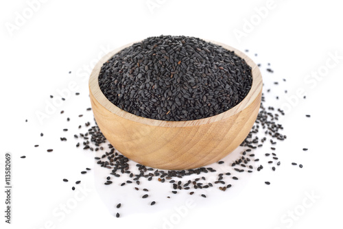 black sesame in wooden bowl on white background