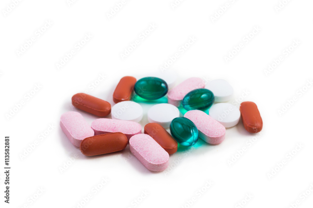 Mixed colorful pills with white background. Mixed colorful pills with white background.