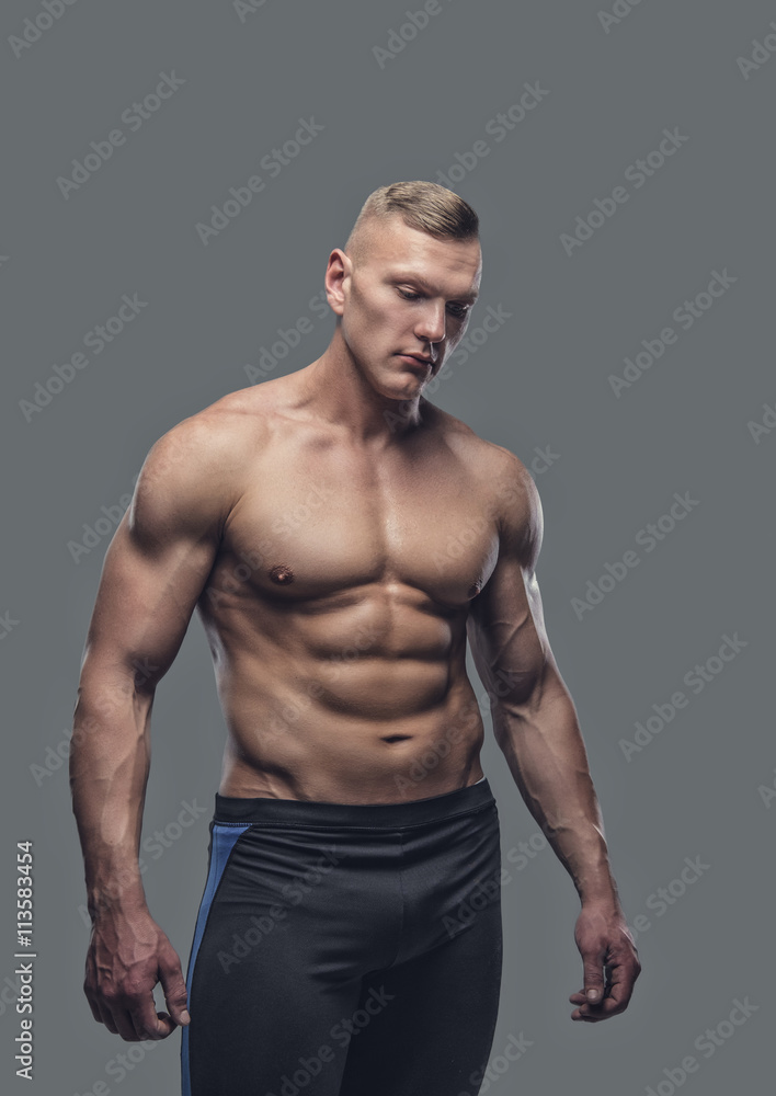Portrait of suntanned shirtless fitness female. Portrait of suntanned shirtless fitness female.