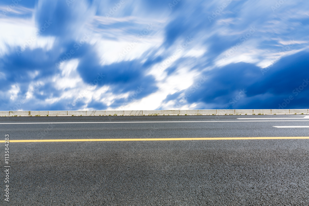 The new asphalt highway is under the blue sky The new asphalt highway is under the blue sky