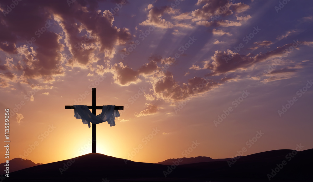 Fototapeta premium Christian cross over beautiful sunset background