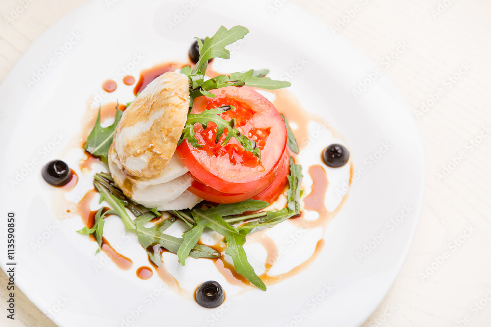 salad with goat cheese and tomatoes in Georgian salad with goat cheese and tomatoes in Georgian