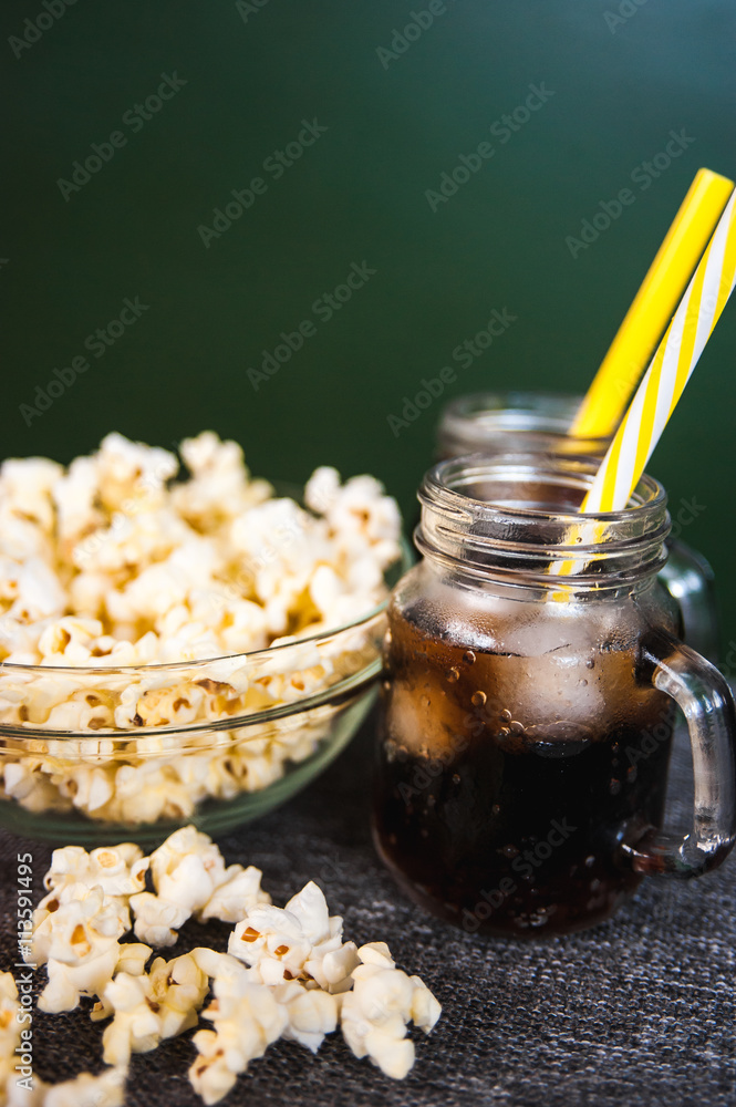 misted bottles of Cola with ice and fresh kettle corn misted bottles of Cola with ice and fresh kettle corn