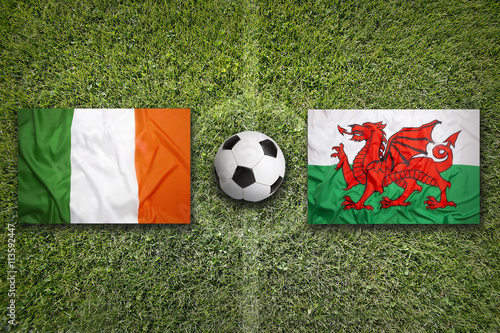 Ireland vs. Northern Ireland flags on soccer field