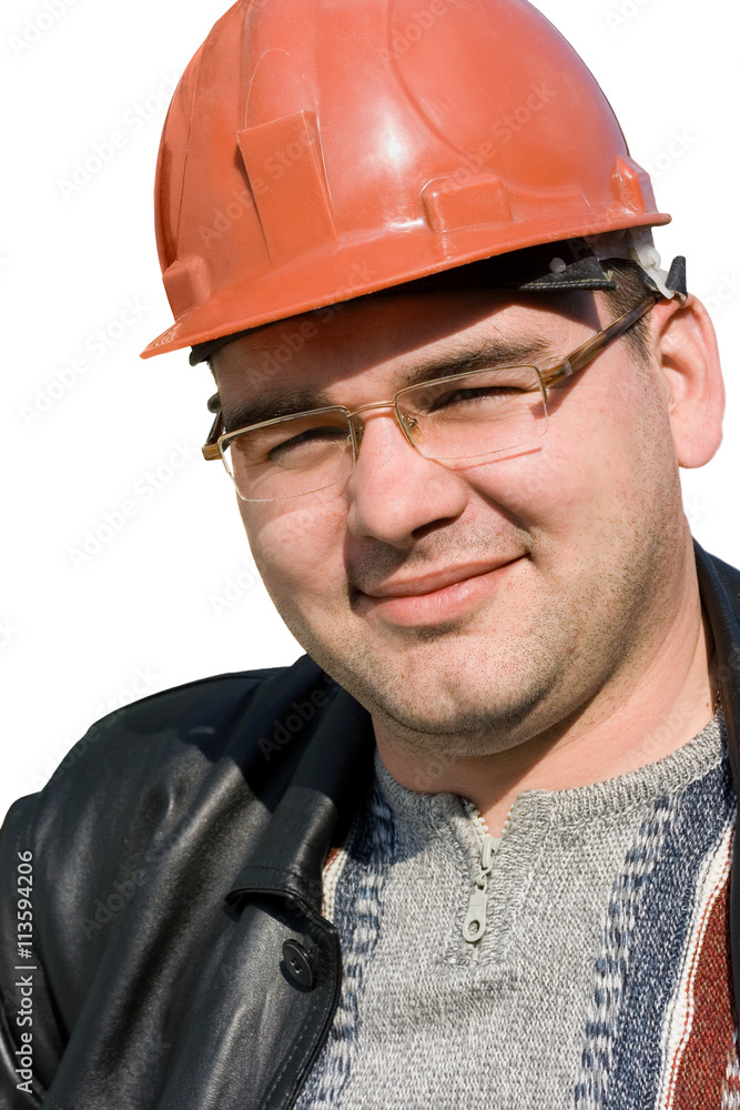 Portrait of a builder man in a jacket and a protective helmet on his head Portrait of a builder man in a jacket and a protective helmet on his head