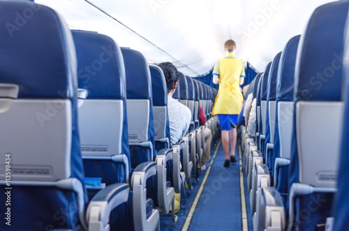 shot of a stewardess in the plane
