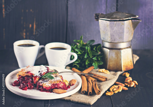 Cherry pie and a cup of coffee. Rustic style. Berry pie. Homemade cherry pie with flaky crust  cup of coffee  bowl with cherries