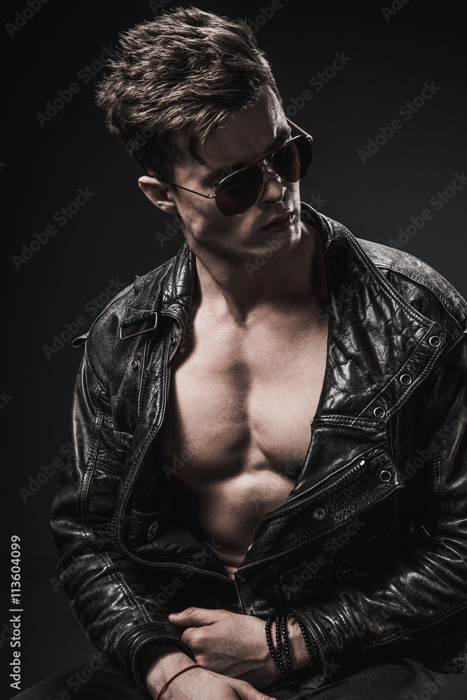 Men's Beauty, Fashion. Portrait Of A Handsome Male Model Posing In Stylish  Clothes. Studio Shot. Stock Photo, Picture and Royalty Free Image. Image  83420036.
