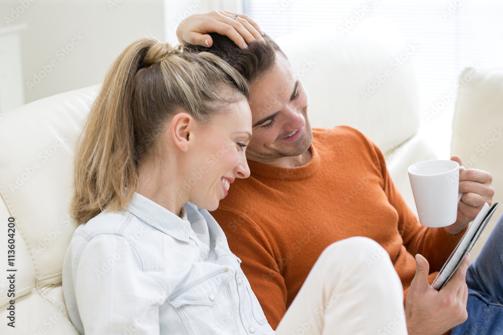 Couple Using Digital Tablet
