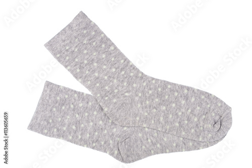Grey polka dot childish socks isolated.