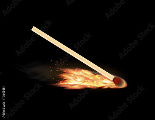 burning matchstick on a black background