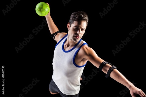 Confident athlete man throwing a ball  © WavebreakMediaMicro