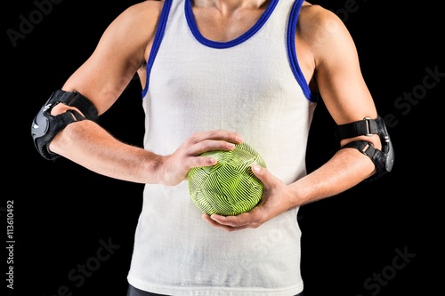 Mid section of athlete man holding ball  © WavebreakMediaMicro