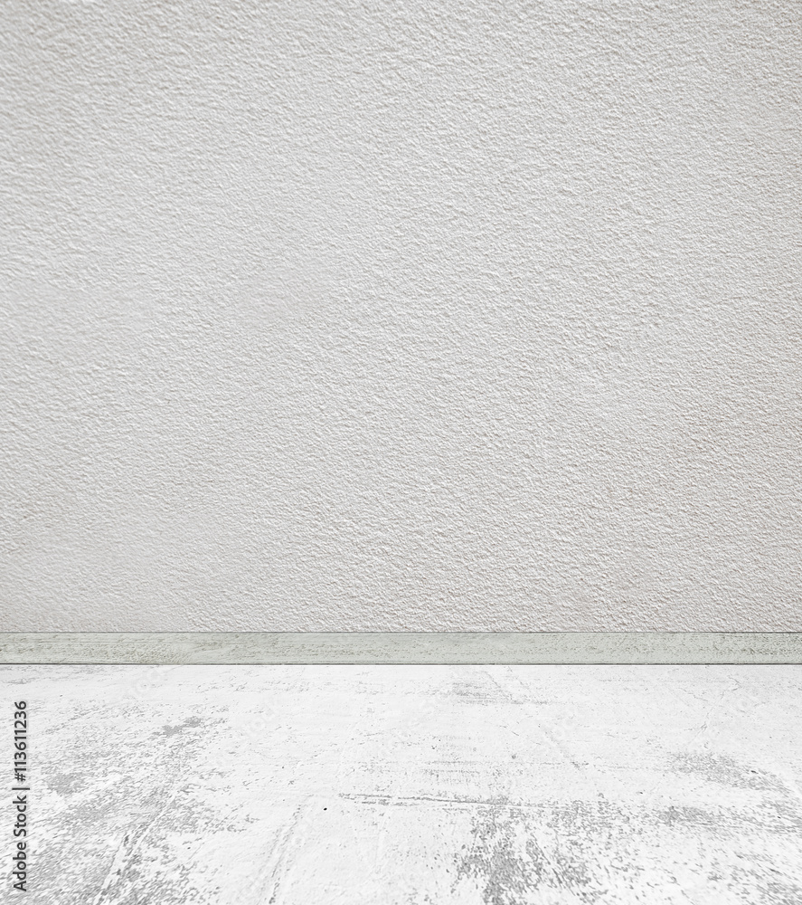 Empty room with concrete wall and stone floor Empty room with concrete wall and stone floor