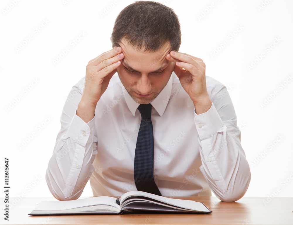 Businessman examining documents Businessman examining documents