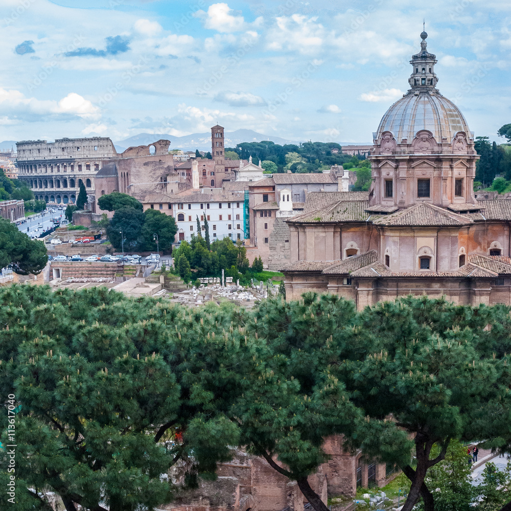 View of Coliseum, Church of Santi Luca e Martina and Roman Forum in Rome, Italy