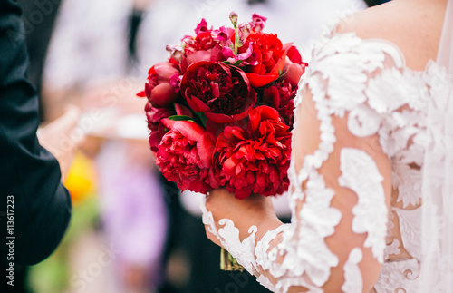 Wedding. The bride's bouquet. Wedding bouquet . A bouquet of red flowers,