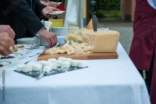 particular of grana cheese during a wedding party