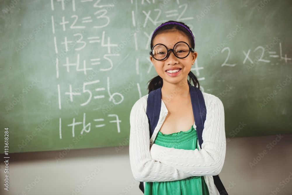 Standing schoolgirl looking at the camera Standing schoolgirl looking at the camera